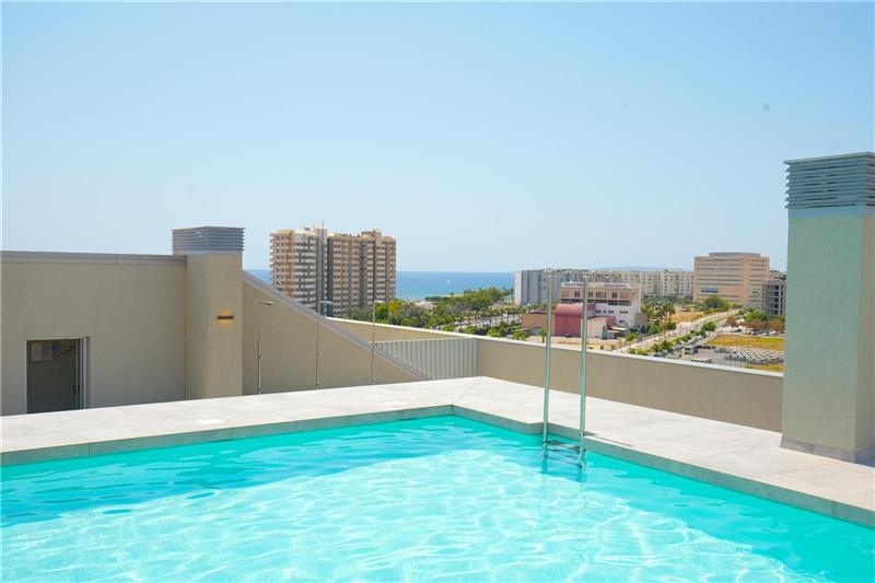Apartment with terrace in a residential complex with a communal swimming pool.